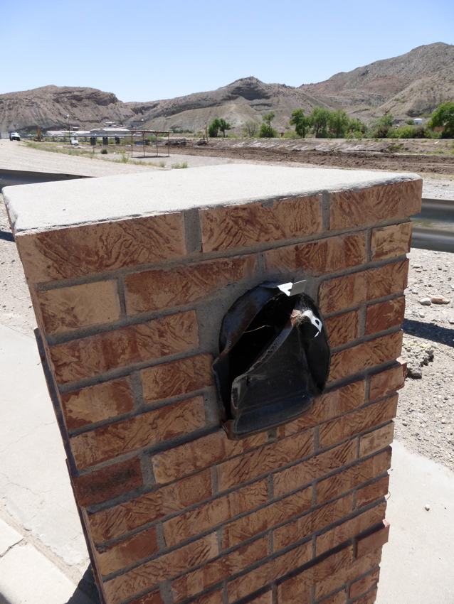 This smashed pllar with a mailbox is all that's left from a once-thriving Smelterwon. 